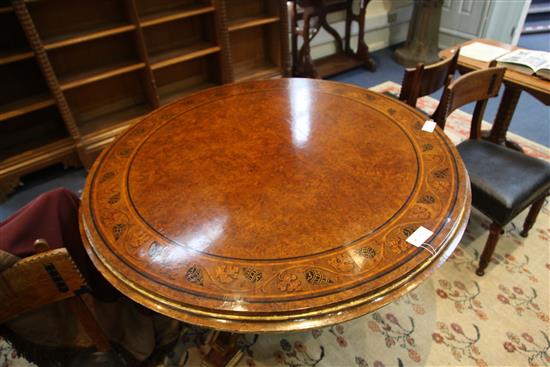 A.W.N. Pugin for Morel & Seddon. An important Gothic revival oak, pollard oak, parcel gilt marquetry centre table, Diam. 4ft 2in. H.2ft